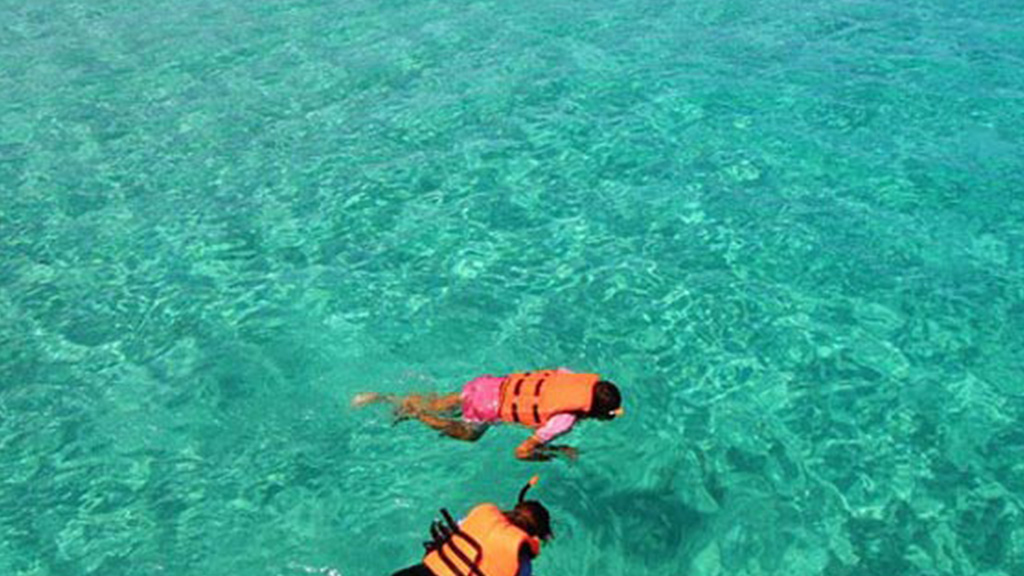Raya Coral Island half day tour by catamaran